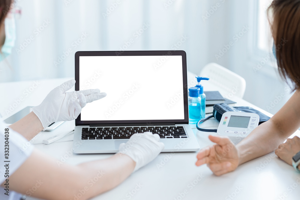 The patient talking with doctor about health In the doctor's clinical. The patient talking with doctor about health In the doctor's clinical.