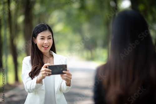 business women using Smartp...