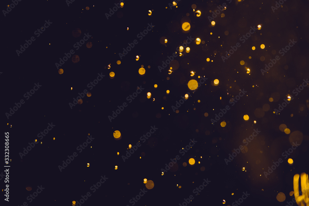 Dark Abstract Gold bokeh sparkle on black Dark Abstract Gold bokeh sparkle on black
