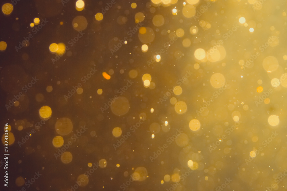 Dark Abstract Gold bokeh sparkle on black