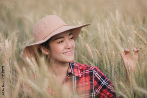 young farmer girl relaxing in barley rice