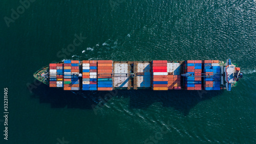 Aerial view container ship carrying container box global business cargo freight shipping commercial trade logistic and transportation oversea worldwide container vessel, Container cargo freight ship.