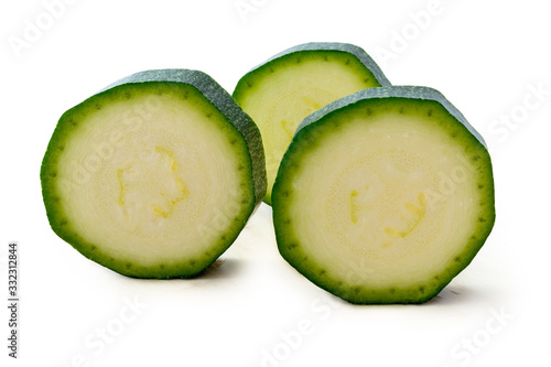 fresh green zucchini slices isolated on white