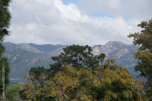 Santa Ynez mountains ridge behind Santa Barbara under heavy clouds on a cold and rainy spring day