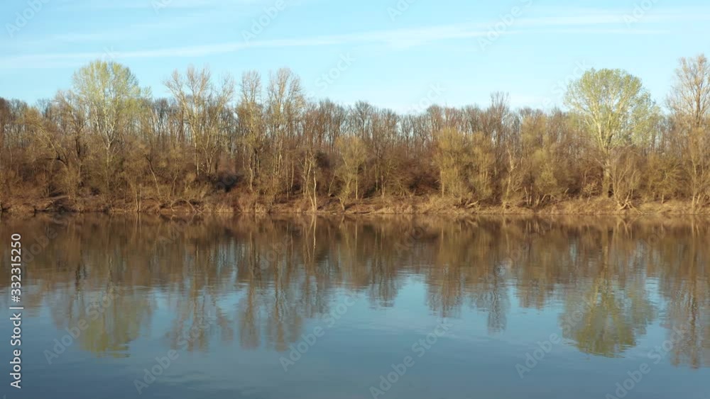 Areal Landscape View of River Sava. Drone fly over blue water and forest at Autumn Season. Filmed in 4k Areal Landscape View of River Sava. Drone fly over blue water and forest at Autumn Season. Filmed in 4k