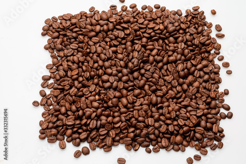 coffee beans close up on a white isolated background,copy space.