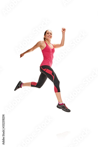 Portrait of young sportive healthy woman participating in marathon