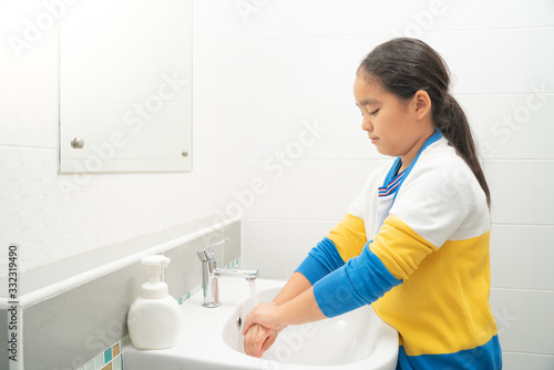 Asian girl Washing hands rubbing with soap  for corona virus prevention, hygiene to stop spreading coronavirus,covid-19,Work from home (WFH), Social distancing, Quarantine, Prevent infection concept.