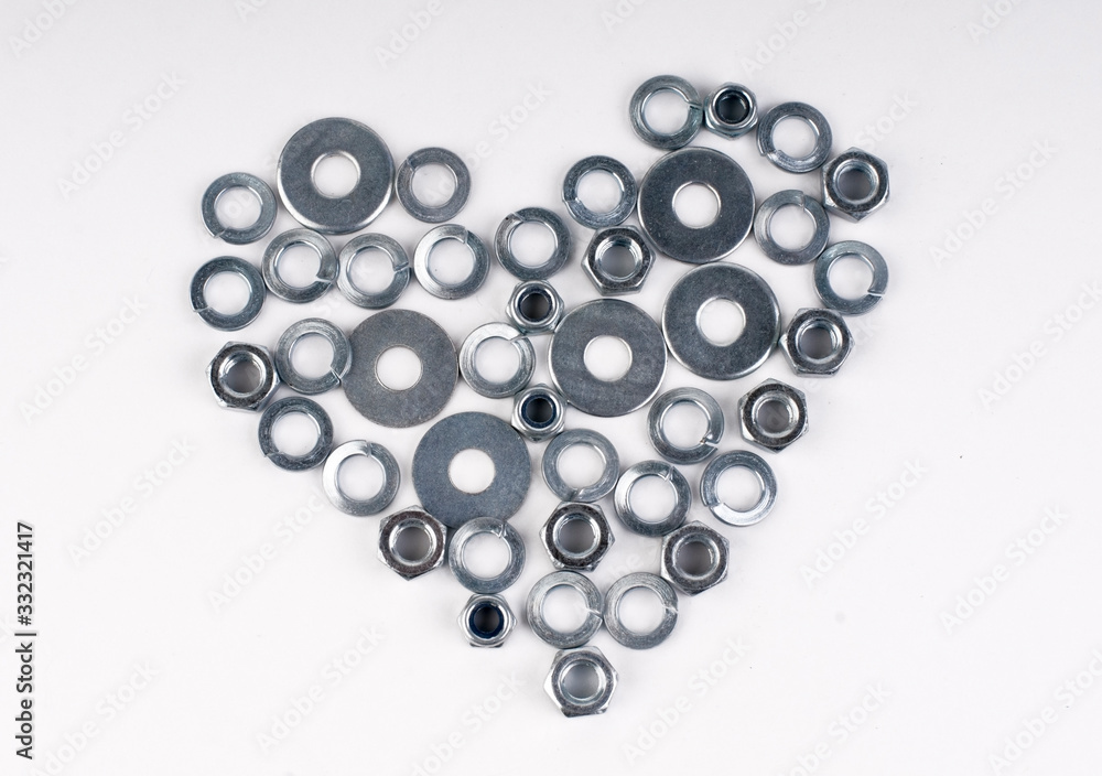 The nuts and washers in the shape of a heart The nuts and washers in the shape of a heart