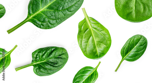 Spinach Pattern. Creative layout made of spinach leaves isolated on white background. Flat lay. Healthy Food concept.