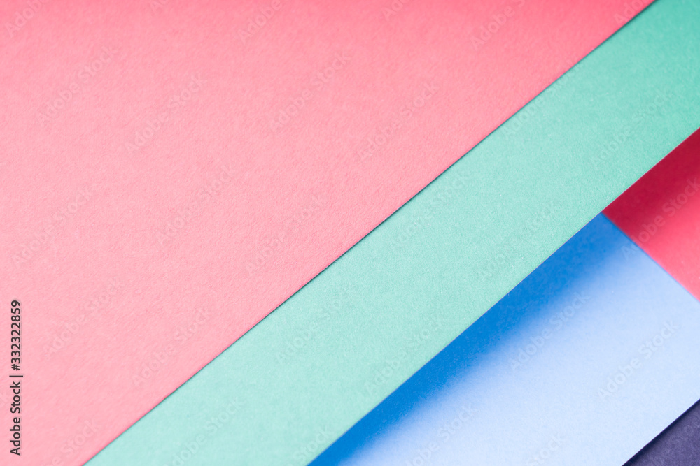 multi-colored sheets of paper , abstract background, tinted image, selective focus multi-colored sheets of paper , abstract background, tinted image, selective focus
