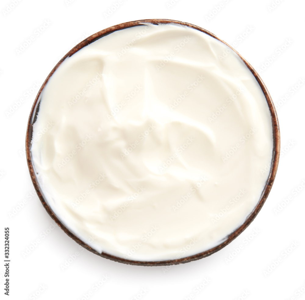Bowl with tasty sour cream on white background Bowl with tasty sour cream on white background