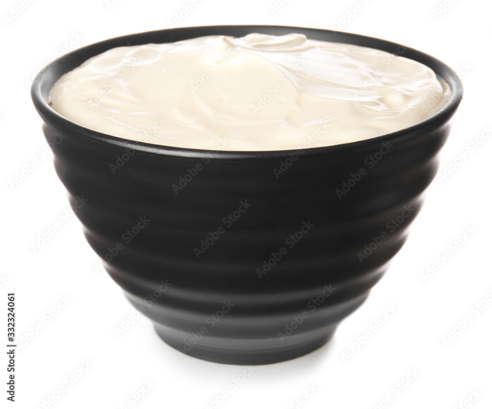 Bowl with tasty sour cream on white background Bowl with tasty sour cream on white background