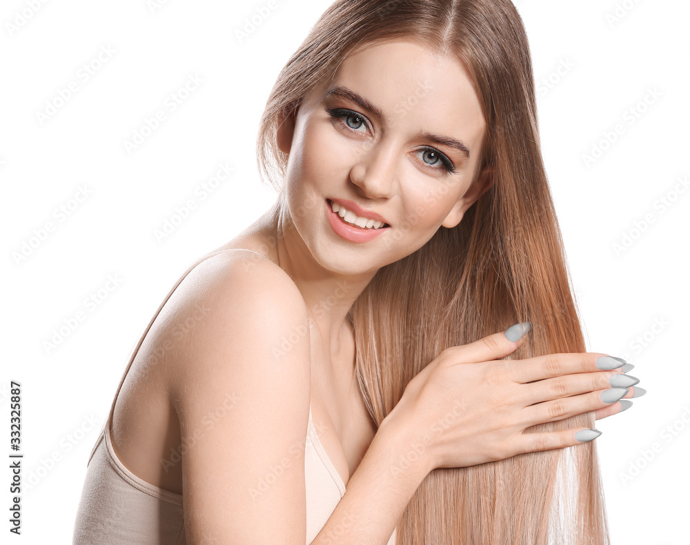 Young blonde with beautiful hair on white background Young blonde with beautiful hair on white background
