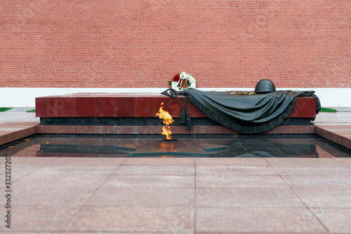 Russia, Moscow, October 2019. Tomb of the Unknown Soldier in the Kremlin in Moscow. The eternal flame in memory of the millions of dead Soviet soldiers.