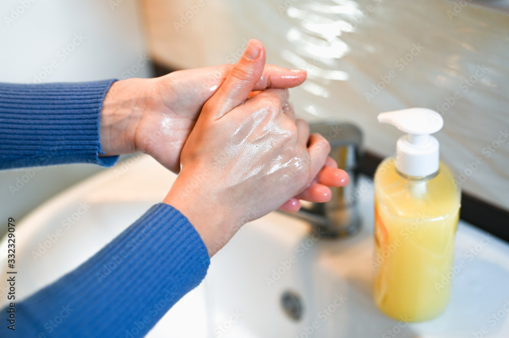 Flush coronavirus from the hands. Corona Virus or bacteria is infected by protection against touching a public object. Customer self-defense in a public place concept. Flush coronavirus from the hands. Corona Virus or bacteria is infected by protection against touching a public object. Customer self-defense in a public place concept.