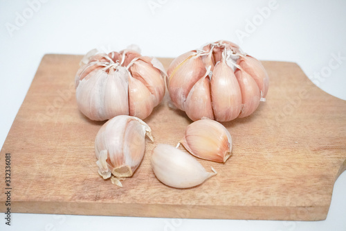 garlic on a wooden tray