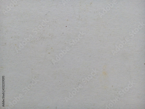 Stain on old white paper sheet texture background. Stained paper. Aged paper background. White aged.