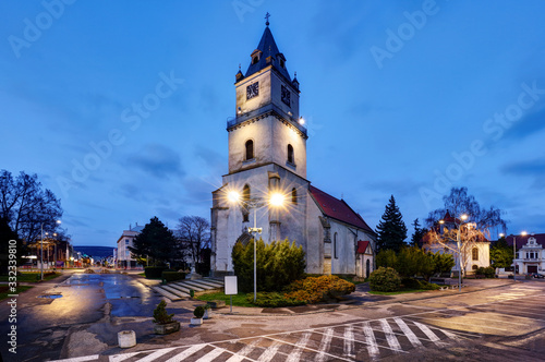 Hlohovec city with church and square at night, Slovakia