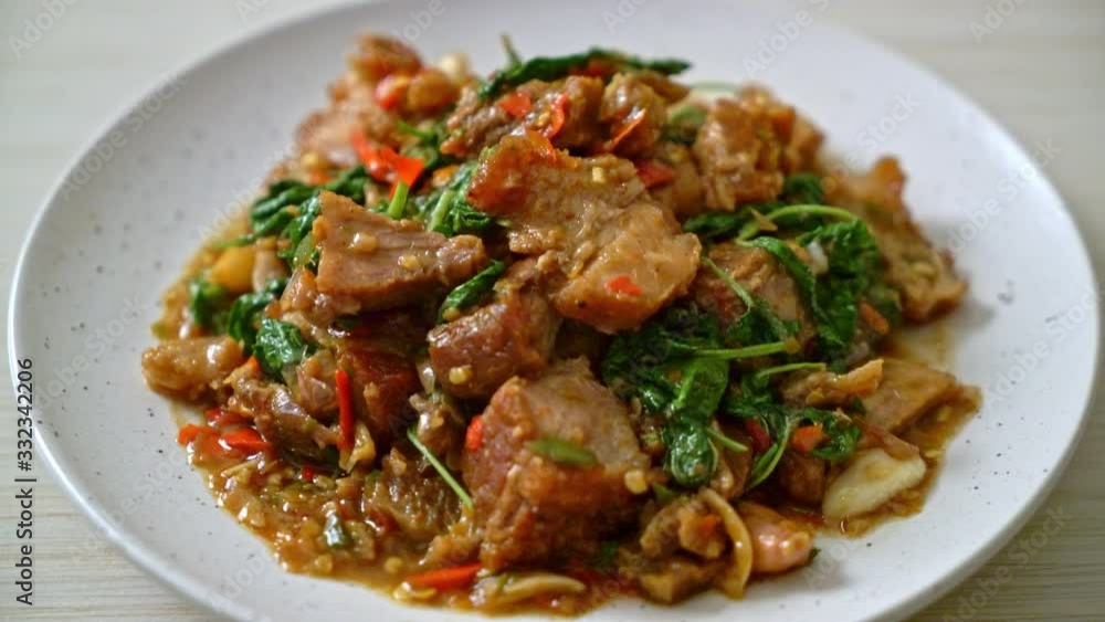 stir-fried crispy pork belly and basil - Asian local street food style stir-fried crispy pork belly and basil - Asian local street food style