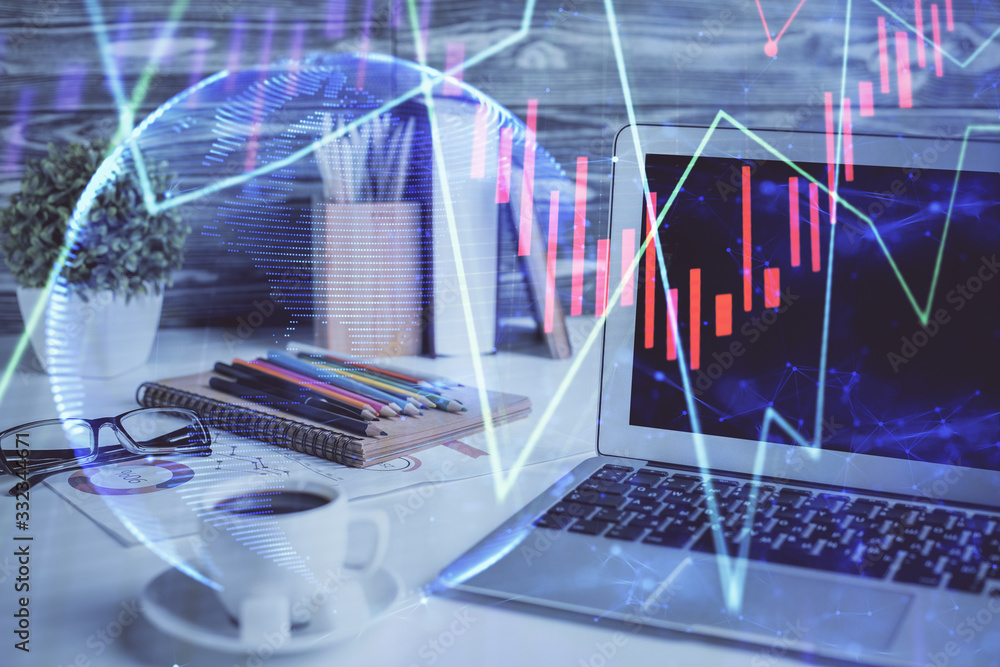 Forex market chart hologram and personal computer background. Double exposure. Concept of investment. Forex market chart hologram and personal computer background. Double exposure. Concept of investment.