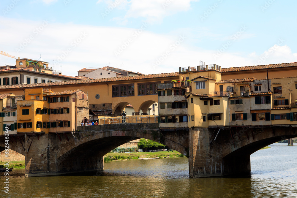 Naklejka premium Firenze, Italy - April 21, 2017: Ponte Vecchio and Arno River in Florence, Firenze, Tuscany, Italy