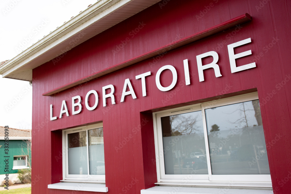 laboratoire french means Medical analysis laboratory sign building study coronavirus covid-19 laboratoire french means Medical analysis laboratory sign building study coronavirus covid-19