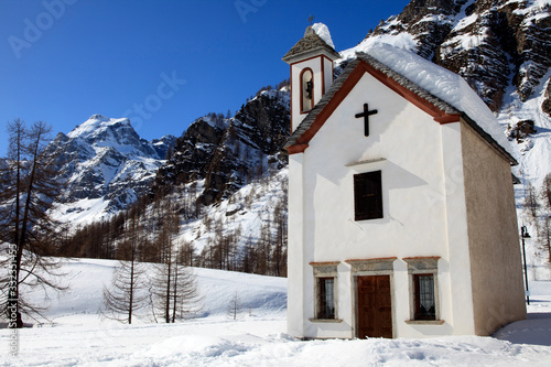 Devero Park ( Verbano-Cusio-Ossola ), Italy - January 15, 2017: The church in Crampiolo village at Alpe Devero Park, Ossola Valley, VCO, Piedmont, Italy