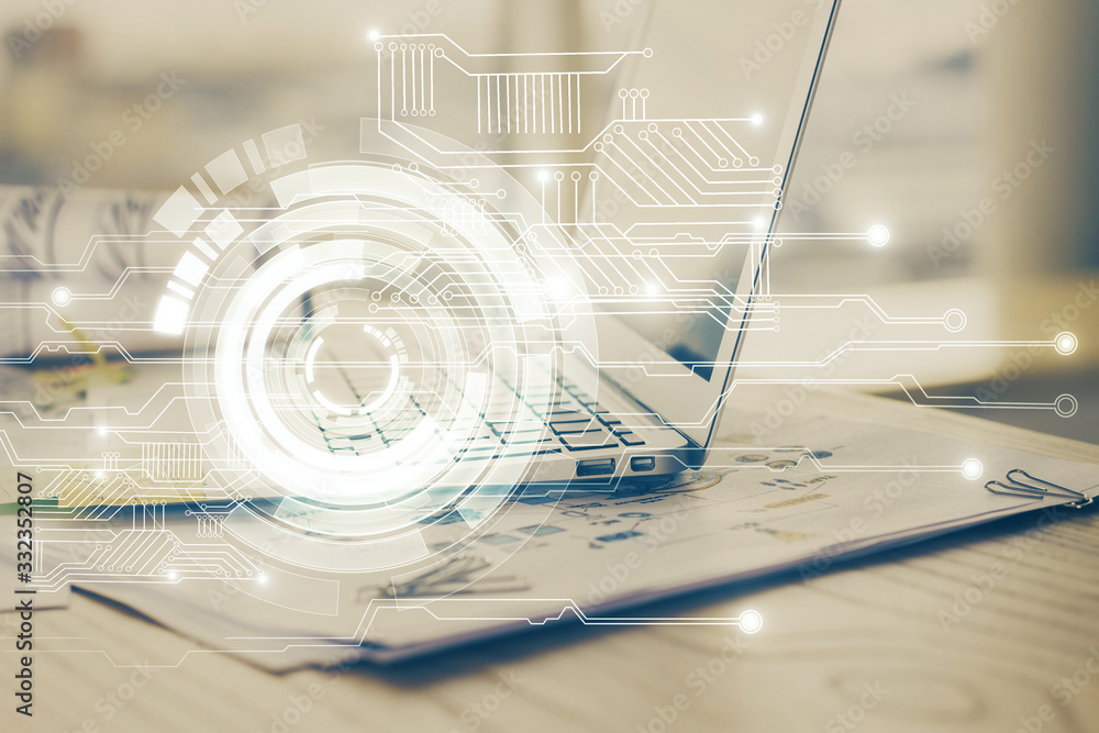 Double exposure of laptop computer and technology theme hologram. Concept of freelance work. Double exposure of laptop computer and technology theme hologram. Concept of freelance work.