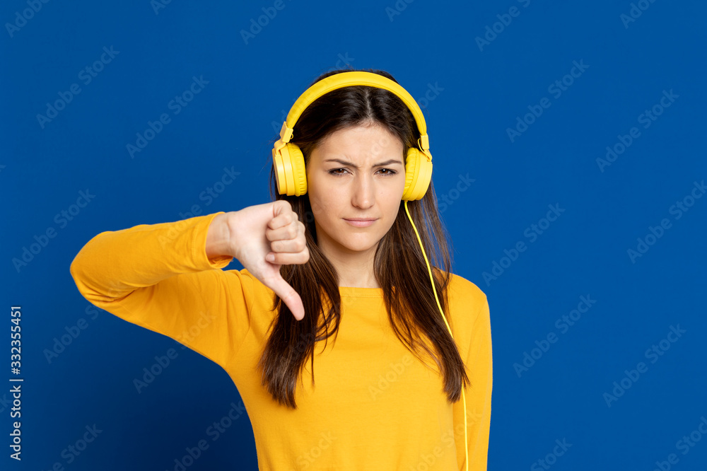 Brunette girl wearing a yellow T-shirt Brunette girl wearing a yellow T-shirt