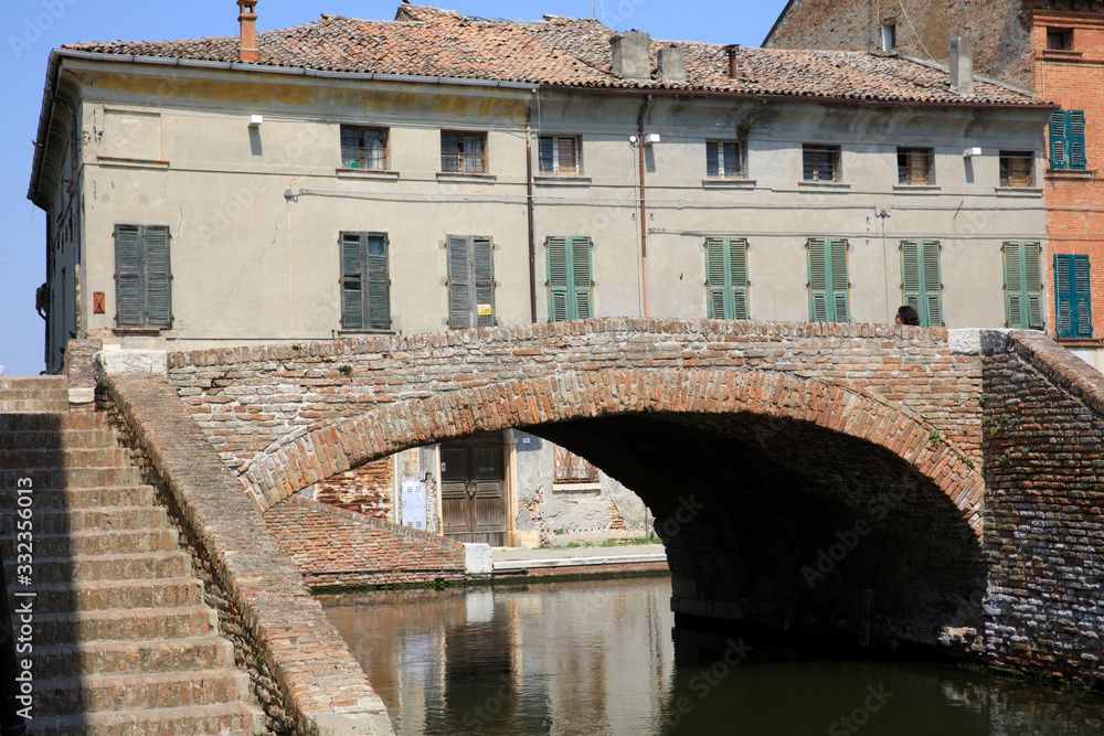 Comacchio (FE),  Italy - April 30, 2017: A bridge in Comacchio village, Delta Regional Park, Emilia Romagna, Italy