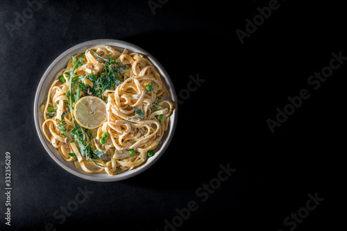 Pasta with a sour cream lemon and herbs © Alen-D