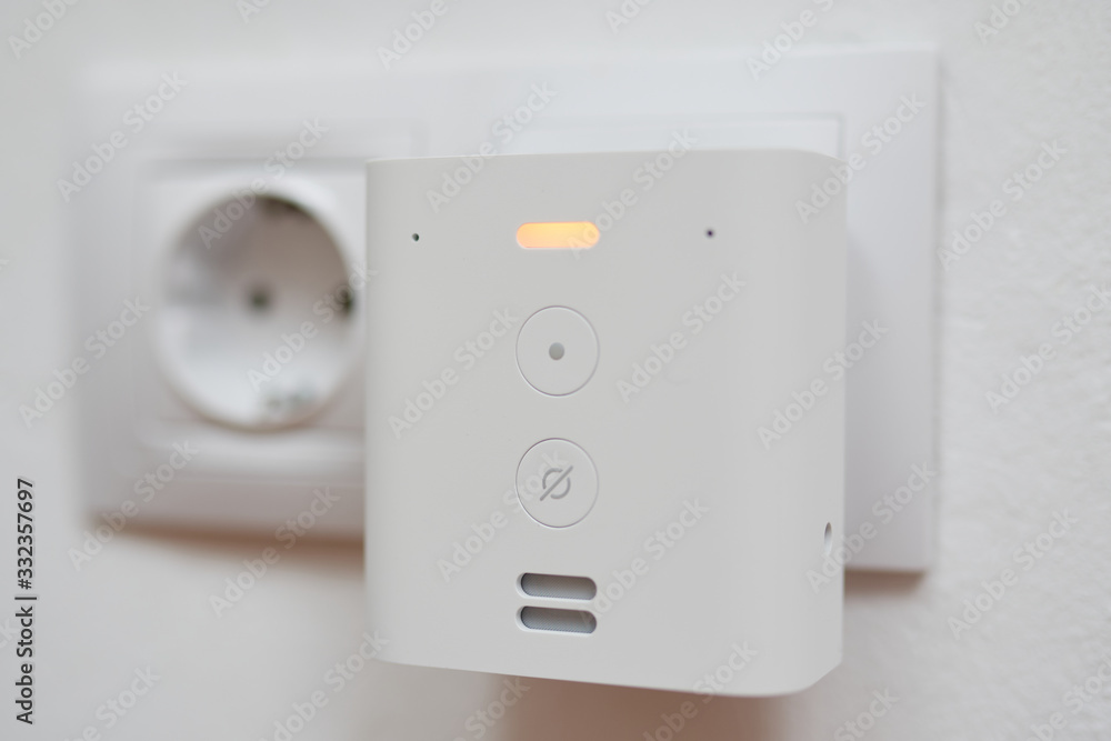 virtual assistant alexa echo flex plugged in with an orange light virtual assistant alexa echo flex plugged in with an orange light