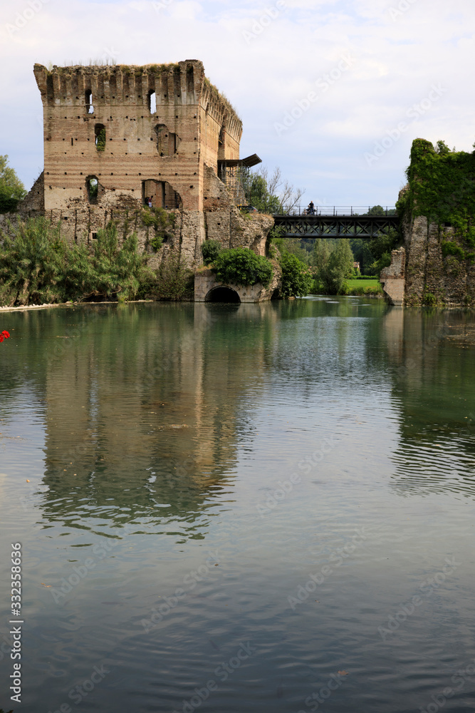 Borghetto (VR),  Italy - April 30, 2017: Mincio river in Borghetto village, Mincio, Verona, Veneto, Italy