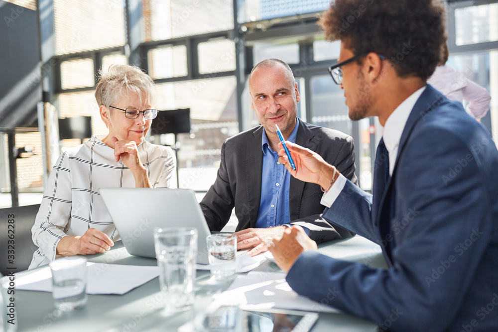 Business people and consultants in business consulting Stock Photo