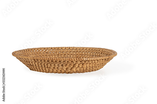 small wicker willow basket for fruit isolated on a white background