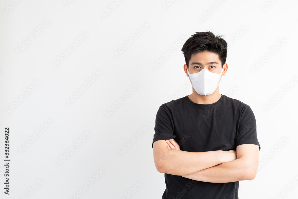 Stop Civid-19 , Asian man wearing Face Mask protect spread Covid-19 Coronavirus on white background
