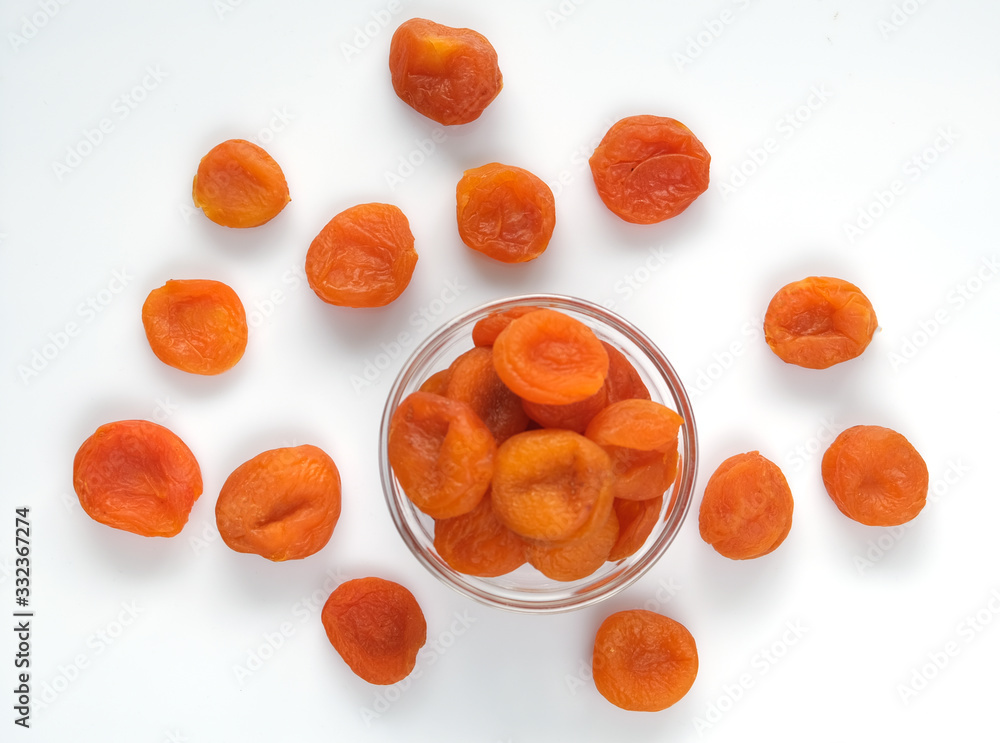 Dried pitted apricots on a white background Dried pitted apricots on a white background