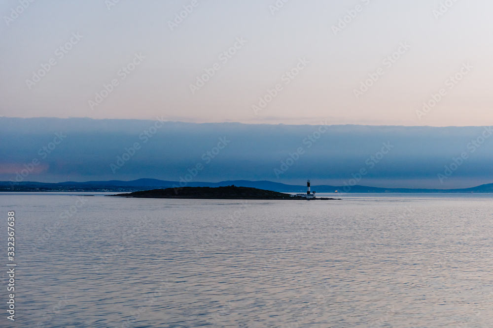 A view over a scottish coastline from across the ocean A view over a scottish coastline from across the ocean