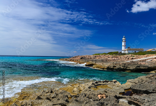 Lighthouse at Cap de Ses Salines on Majorca island, Spain Mediterranean Sea