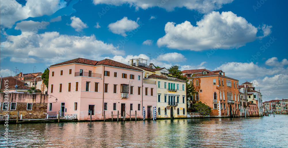 Old plaster buildings along a canal in Venice