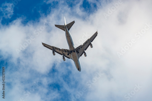 Passenger jet plane in the blue sky