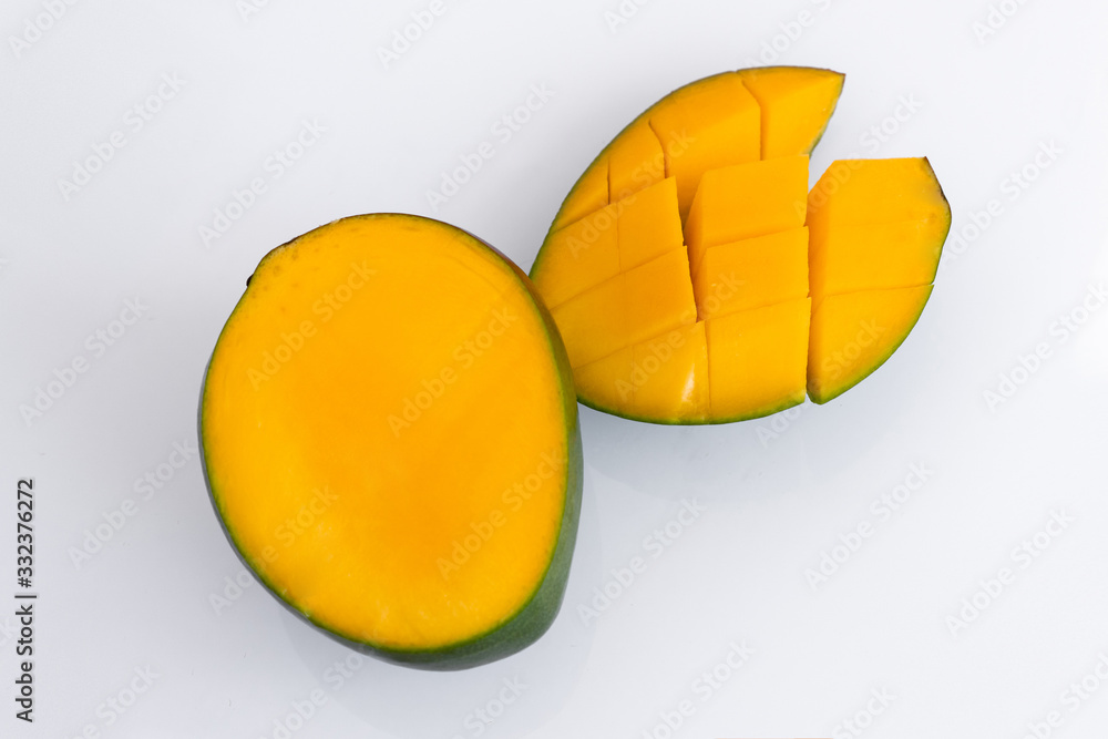  juicy sliced ​​mango isolated on a white background