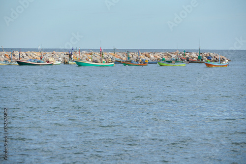 Fisherman boat in city habour port. photo