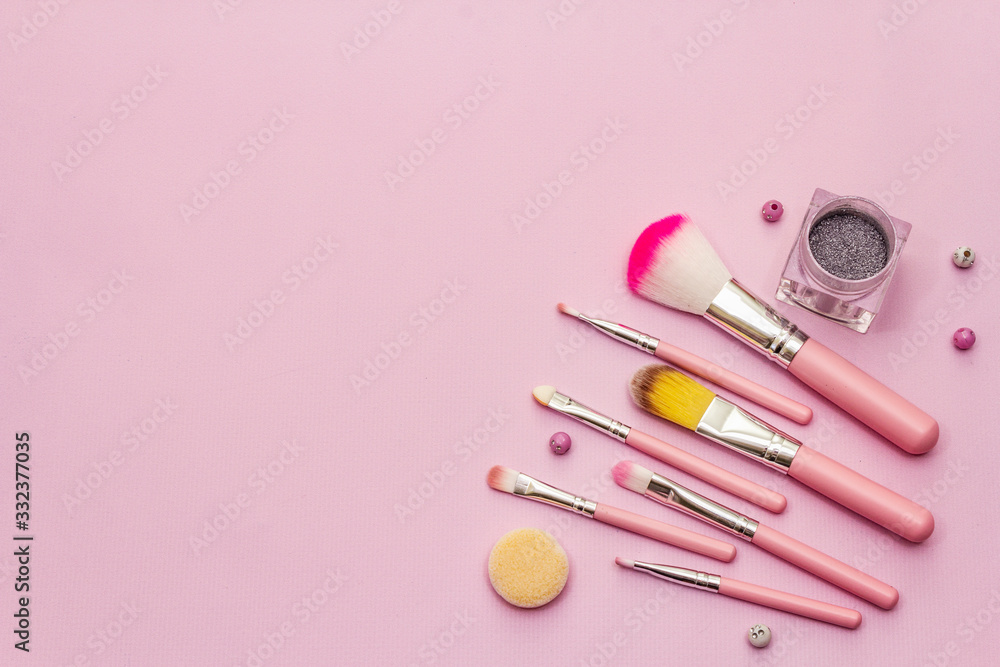 Fototapeta Makeup cosmetic set on pink background