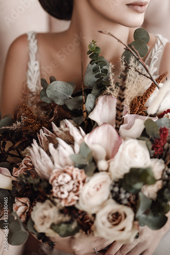 Fototapeta Naklejka Na Ścianę i Meble -  bridal bouquet with protea and pink and white roses
