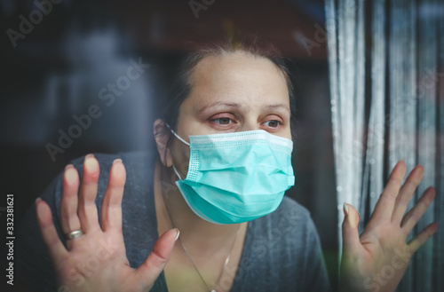 Surgical protection mask on woman's face