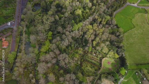 Aerial footage of beautiful gardens and flowerbeds in Terra Nostra Park in Sao Miguel photo