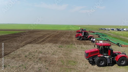 Aerial view of agricultural machinery ready to work in the field