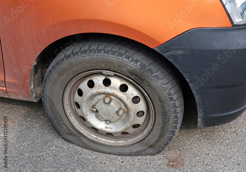 Flat tire of a car after an accident
